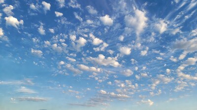 Fluffy Clouds in Blue Sky