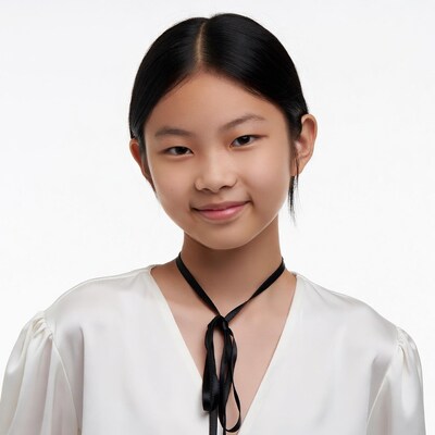 Asian girl smiling with black bow tie