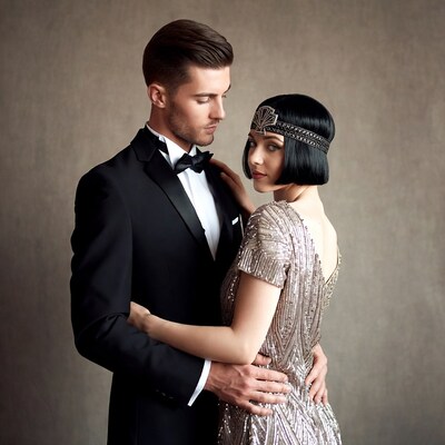 Man embracing woman in 1920s attire