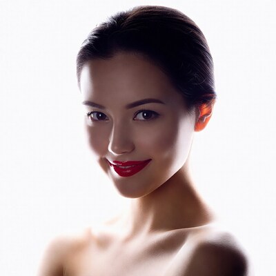 Asian woman smiling with red lipstick