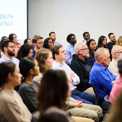 Diverse audience at health agency meeting