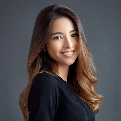 Asian woman smiling in black top