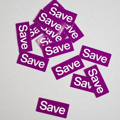 Purple Save Stickers Scattered on White