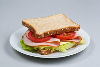 Ham Tomato Sandwich on White Plate