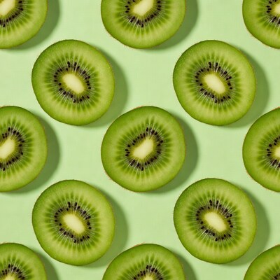 Kiwi Slices on Green Background