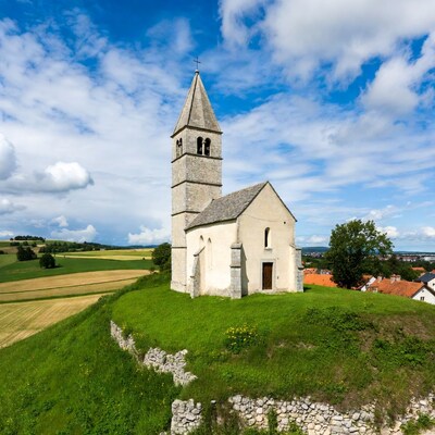 Stone Church on Hilltop with Fields