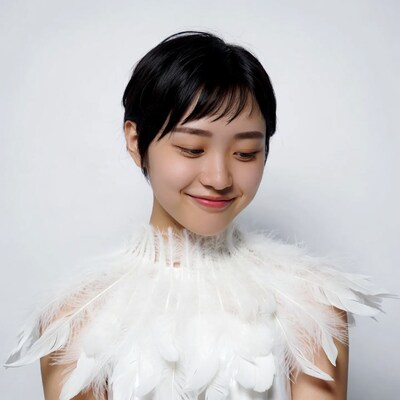 Asian woman with white feather collar