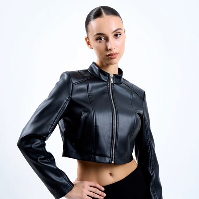 Woman in black leather crop jacket