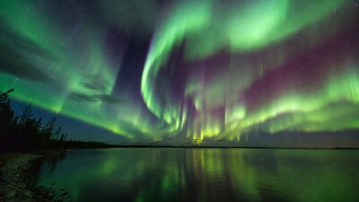 Northern Lights over Lake and Trees