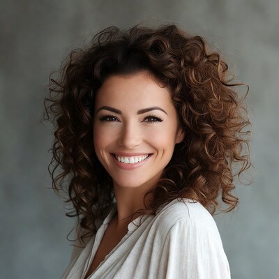 Woman with curly hair smiling
