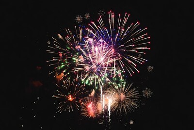 Colorful Fireworks Exploding in Night Sky