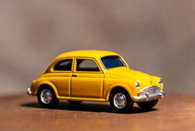 Yellow vintage toy car