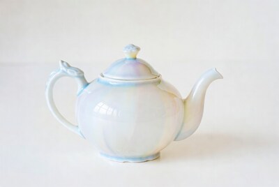 Iridescent Blue Teapot on White Background