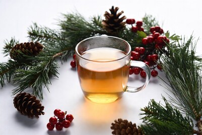 Glass of Tea with Pine Branches and Holly
