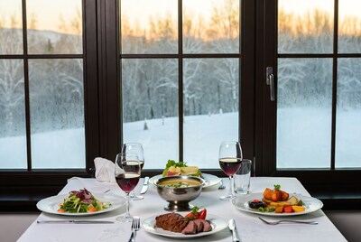 Elegant Dinner Table by Snowy Window