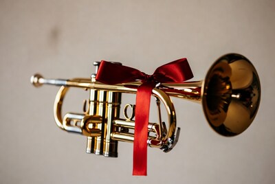 Golden Trumpet with Red Bow