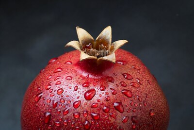 Red Pomegranate with Water Droplets