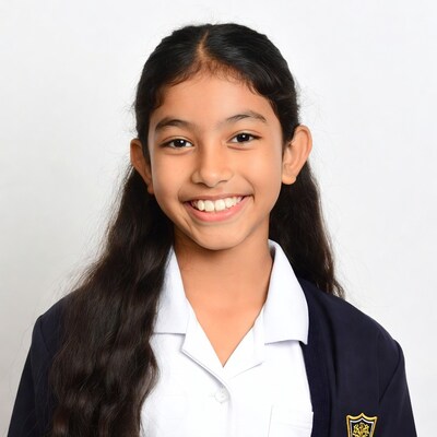 Asian girl smiling in school uniform