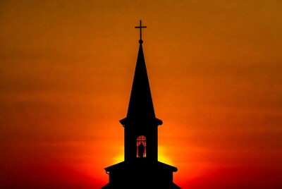 Church Steeple Silhouette at Sunset