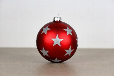 Red Christmas ornament with silver stars