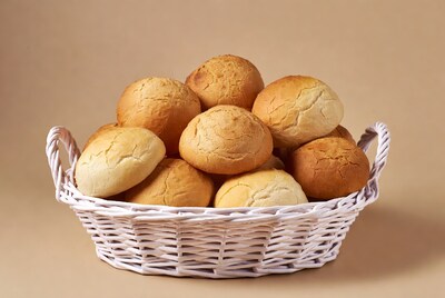 Fresh bread rolls in white basket