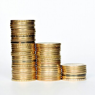 Stacks of gold coins varying heights