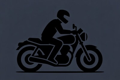 Man riding motorcycle silhouette