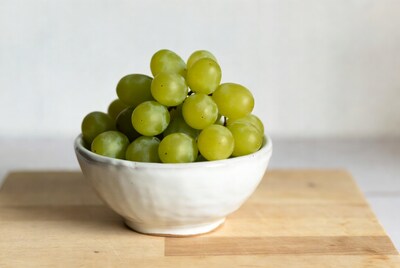 Green grapes in white bowl
