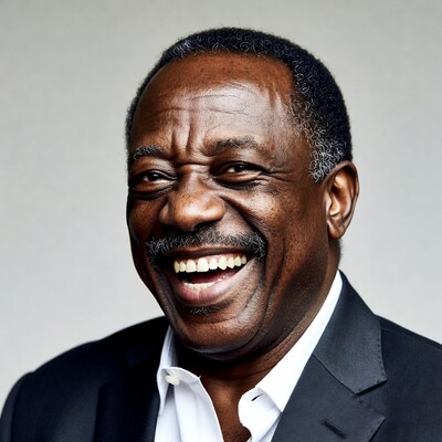 African-American man laughing in suit
