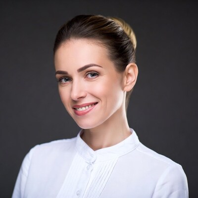 Smiling woman in white blouse