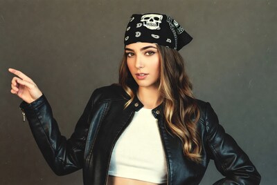 Woman in skull bandana and leather jacket