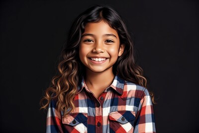Smiling Asian girl in plaid shirt