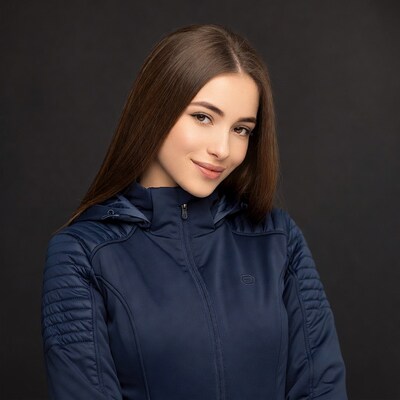 Woman in blue hoodie smiling