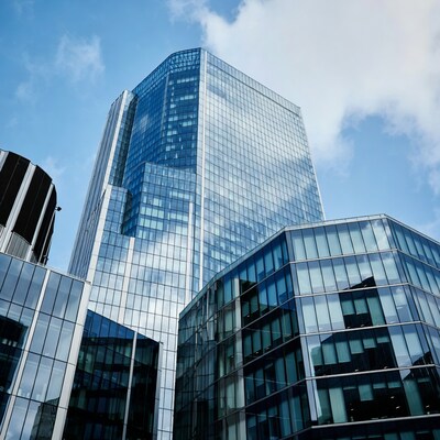 Modern glass skyscrapers against blue sky