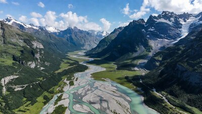 Aerial View of Glacial River in Mountains