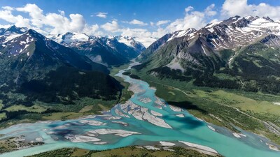 Turquoise River in Snowy Mountains