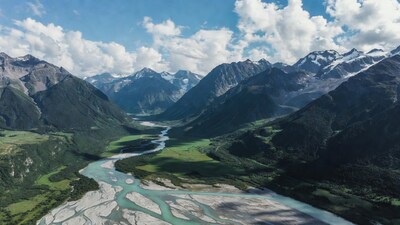 Aerial view of river in snowy mountains