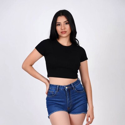 Asian woman in black crop top denim shorts