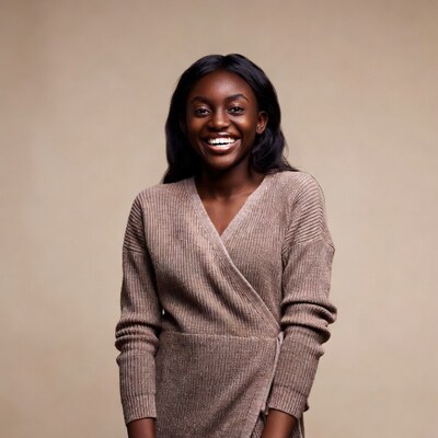 Smiling Black woman in knit dress
