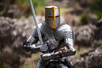 Knight in silver armor holding sword
