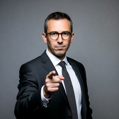 Man in suit pointing finger