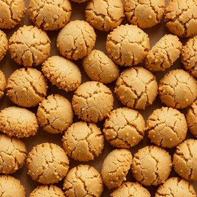 Golden shortbread cookies on brown paper