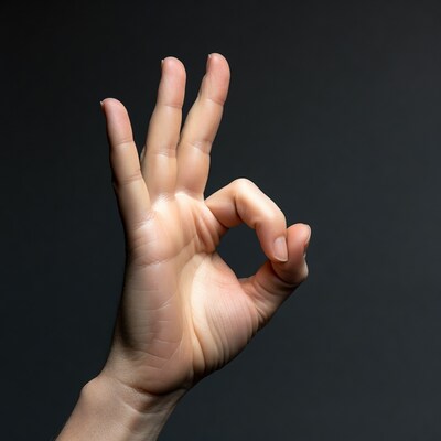 Hand making OK sign