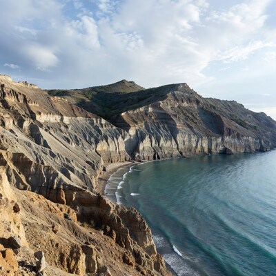 Cliffside Beach with Turquoise Sea