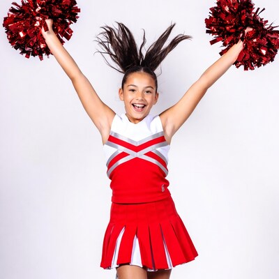 Girl cheerleader with red pom poms
