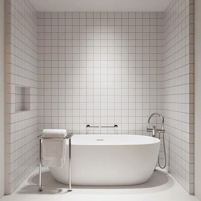 White Bathtub in Tiled Bathroom