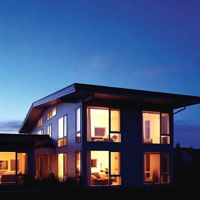 Modern house lit at dusk