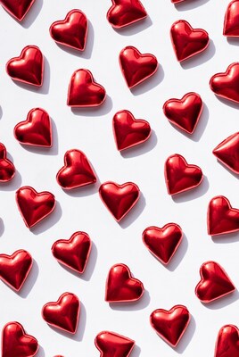 Shiny Red Hearts on White Background
