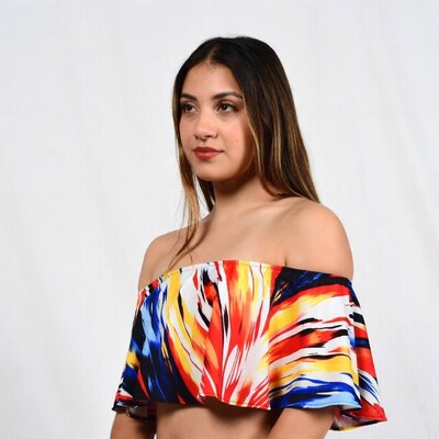Woman in colorful off-shoulder crop top