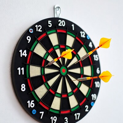 Dartboard with yellow darts
